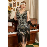 Gold sequin and fringe detail on 1920s Art Deco dress