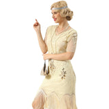Beaded and sequin detail on cream 1920s flapper hire dress