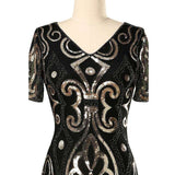 Close up of detail on gold 1920s sequined flapper hire dress