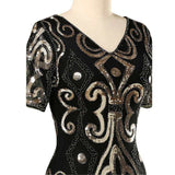 Close up of sequin detail for gold 1920s sequined flapper hire dress