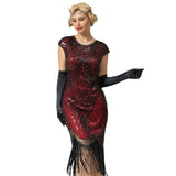 Close-up of black beaded fringe overlay on red 1920s flapper dress hire