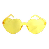 Heart-shaped yellow Perspex party glasses.  Description: These vibrant party glasses are crafted from yellow Perspex material, forming a whimsical heart shape. The transparent yellow colour adds a playful touch, making them the perfect accessory for festive occasions