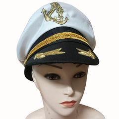 White admiral-style captain hat with a black brim, gold anchor design on top, gold leaf detailing on the brim, and gold trim on the hatband, displayed on a mannequin.