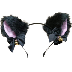 Black faux fur cat ears with pink inner fabric on metal headband. bottom of ears have small, black ribbon bows with gold, round bells. on a white background.