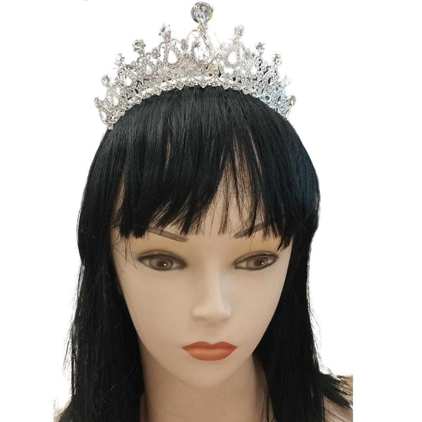 Crystal Princess Tiara in silver, adorned with rhinestone detailing, worn on a mannequin with a black wig, against a white background