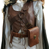 Medieval-style belt bag in brown with bronze-gold metal details, a matching belt and holster/skirt hike. Modelled with Viking style accessories.