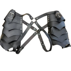 Fantasy Warrior Armour featuring high-quality faux leather with stacked shapes of leather riveted at the side. The armour includes adjustable belts with silver rivets and buckles, X-shaped attachments at the front and back, creating a fierce and detailed design. Displayed flat on a white background to showcase the intricate craftsmanship.