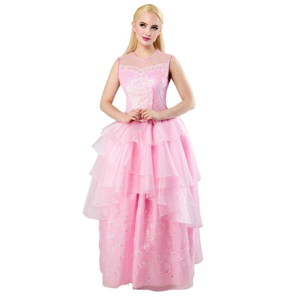 Lady with blonde hair, wearing the Glinda Wicked costume, standing with hands on her stomach and looking up. The costume includes a shimmering pink bodice, and a cascading tulle skirt against a white background