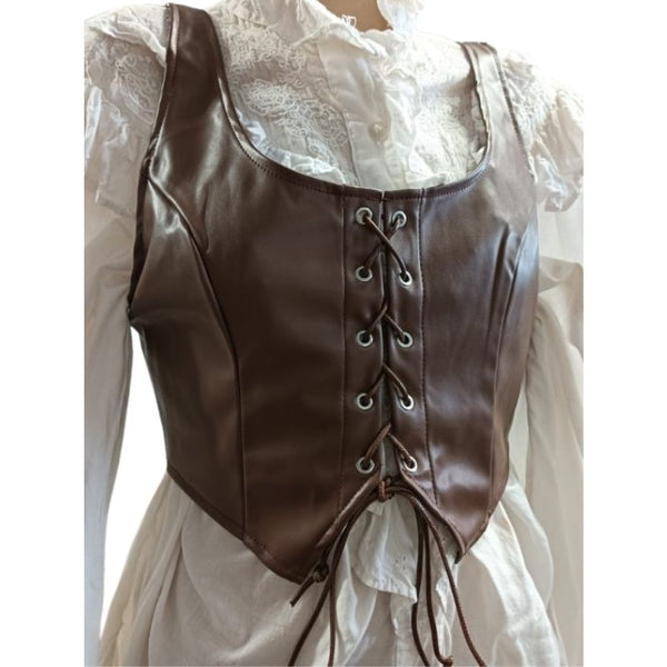 Leather look vest with lace up front on display