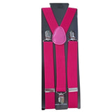 Pink clip-on suspenders attached to cardboard packaging, featuring adjustable straps and metal clips.