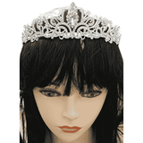 Front view of the Royal Tiara in silver, adorned with silver rhinestone crystals, worn on a mannequin with a black wig, against a white background