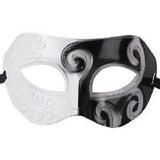 Black and white antique Venetian eye mask with swirl detail and ribbon tie