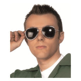 Person wearing sunglasses with a plain background
