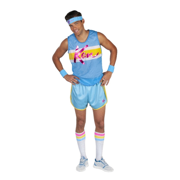 Barbie Ken exercise adult costume, blue sports shorts with yellow trim, blue tank top with metallic print "Ken" , sweat bands and headband with Ken logo.