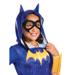 Child wearing an officially licensed Batgirl DC Super Hero Girls costume with hooded jumpsuit, wings and mask