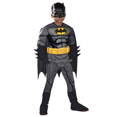 Child wearing an officially licensed Batman Premium costume with muscle chest, cape and mask