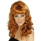 Beehive beauty auburn wig, long with soft curls and fringe.