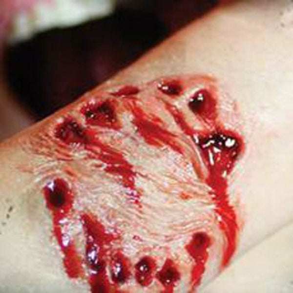 Big Bite 3D FX Transfer by Tinsley Transfers. Realistic latex-free werewolf bite prosthetic for Halloween.