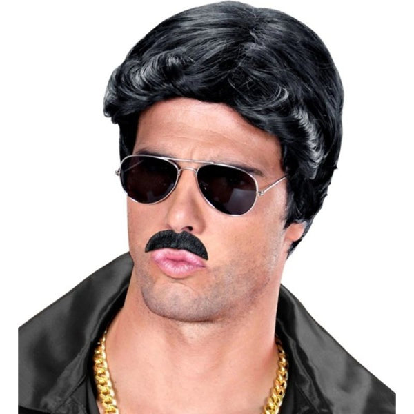 Man wearing black moustache with disco theme costume