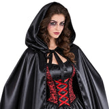 Close-up of black satin hooded cape and ribbon neckline ties
