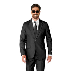 Man wearing black Suitmeister costume suit with matching tie
