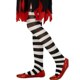 Child wearing black and white striped tights for Book Week, witch and Wonderland-inspired costumes.