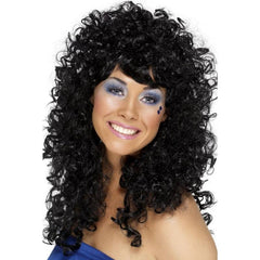  Boogie Babe Wig in black featuring long, voluminous curls and a straighter fringe, perfect for disco or retro-themed costumes.