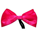Bow tie in neon pink on black elastic.