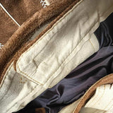 Showing lining and inside waist of brown leather lederhosen