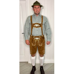 Brown suede leather lederhosen with embroidered eagle and deer designs, traditional Oktoberfest costume.