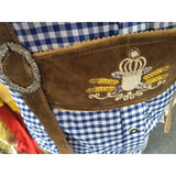 Traditional Bavarian outfit with brown leather apron and blue checkered shirt.