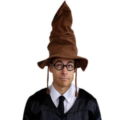 A woman wearing a brown pointed wizard hat and a black robe, holding a wand against a plain white background.