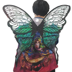 A pair of large butterfly wings with black lace-like outlines and iridescent green, blue, pink, and green sections, shown on a plain white background with smaller folded views below.