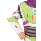 Child posing in an officially licensed Buzz Lightyear deluxe costume with padded Space Ranger suit.