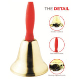 Gold bell with red handle on a white background