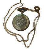 Decorative pocket watch with chain on a white background