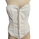 White corset on a mannequin against a white background