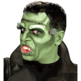 Green costume face paint shown on monster character makeup