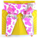 Cowgirl gun set in pink and white cow print, guns with pink handles.