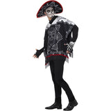 Person wearing a Day of the Dead costume with black and white design on a white background