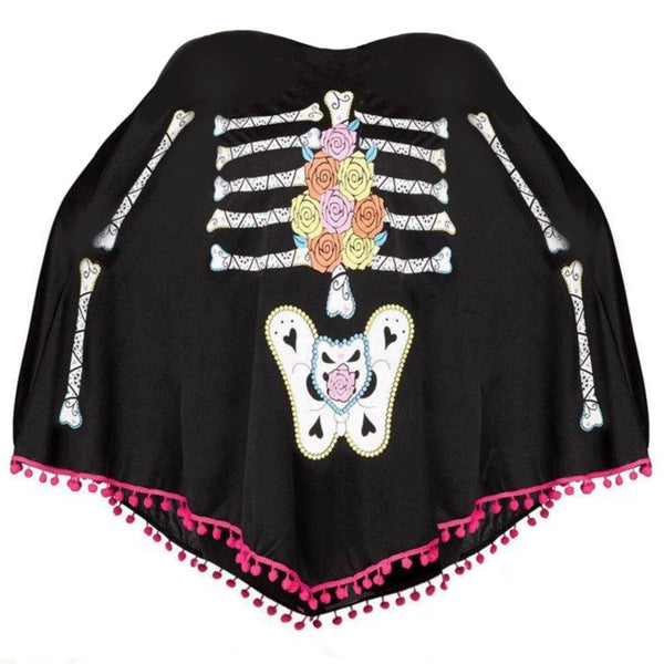 Black Day of the Dead skeleton poncho with colourful floral print and pink pom-pom trim