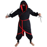 Adult ninja costume with black tunic, hood, face scarf, and red trim
