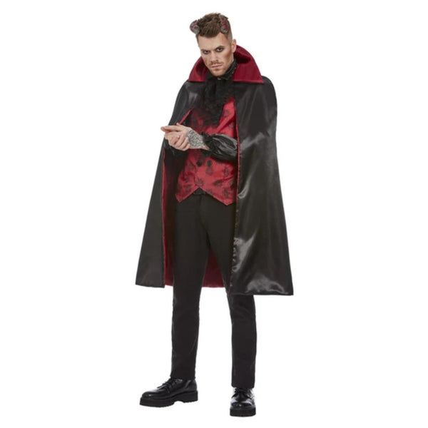 Devil men’s costume with black shirt, red printed vest, knee-length red lined cape, and horns