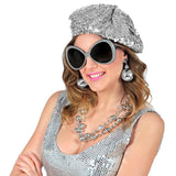 Woman wearing silver disco ball necklace