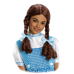Officially licensed Dorothy child wig with strawberry blonde pigtails for Wizard of Oz, Book Week and Halloween costumes.