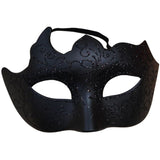 Black mask with intricate designs on a white background