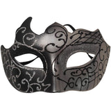 Decorative black and silver mask on a white background