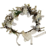 Floral headband with white flowers and greenery on a white background