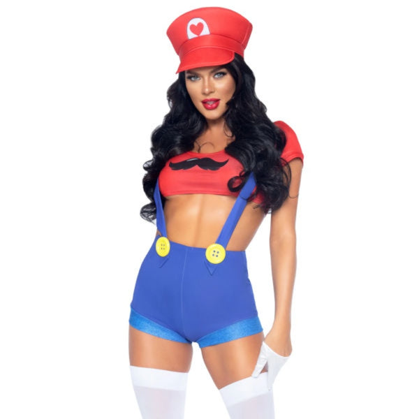 Model in women’s Gamer Babe costume with red crop top, blue suspender shorts, and red hat – cosplay video game outfit.