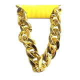 Gangsta gold bracelet in large link plastic.